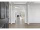 Bright entryway with hardwood floors, showcasing the living room at 36 Steppe Way, Garner, NC 27529