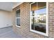 Exterior view showcasing white windows and brick at 36 Steppe Way, Garner, NC 27529