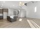 Open concept kitchen with island and stainless steel appliances at 36 Steppe Way, Garner, NC 27529