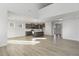 Open concept kitchen with island and dark cabinetry at 36 Steppe Way, Garner, NC 27529