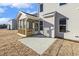Screened porch and concrete patio in backyard at 36 Steppe Way, Garner, NC 27529