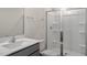 Bathroom with gray vanity, white toilet, and a large shower stall at 160 Perseus St, Angier, NC 27501