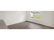 Bright dining area with large window and hardwood floors at 160 Perseus St, Angier, NC 27501