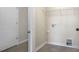 Laundry room with shelving, flooring and a door at 160 Perseus St, Angier, NC 27501