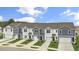Aerial view of five townhouses with driveways and landscaping at 160 Perseus St, Angier, NC 27501
