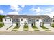 Aerial view of five townhouses with driveways and landscaping at 160 Perseus St, Angier, NC 27501