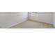 Bright bedroom featuring carpeted floors and neutral walls at 168 Perseus St, Angier, NC 27501