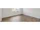 Bright bedroom with carpeted floors and large window at 168 Perseus St, Angier, NC 27501
