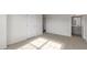 Spacious bedroom with carpeted floor and access to bathroom at 168 Perseus St, Angier, NC 27501