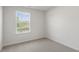Simple bedroom with carpeted floors and a window at 168 Perseus St, Angier, NC 27501