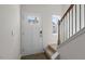 Bright entryway with staircase and neutral color palette at 168 Perseus St, Angier, NC 27501