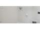 Small laundry room with a white utility sink and shelving at 168 Perseus St, Angier, NC 27501