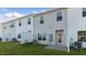 View of townhouses' backyards with patios and fences at 172 Perseus St, Angier, NC 27501