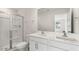 Clean bathroom with double vanity and walk-in shower at 172 Perseus St, Angier, NC 27501