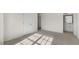 Spacious bedroom with carpet flooring and ensuite bathroom at 172 Perseus St, Angier, NC 27501