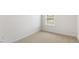 Bright bedroom with a window and neutral carpet at 172 Perseus St, Angier, NC 27501