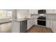Modern kitchen with stainless steel appliances and granite countertops at 172 Perseus St, Angier, NC 27501