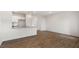 Open concept living area with kitchen island and hardwood floors at 172 Perseus St, Angier, NC 27501