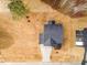 Aerial view of house featuring a backyard, dark roof, and paved driveway at 7404 Prato Ct, Wendell, NC 27591