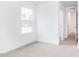 Inviting bedroom features soft carpet, a window with natural light, and recessed lighting at 7404 Prato Ct, Wendell, NC 27591