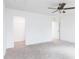 Well-lit bedroom features plush carpet, with a closet and en suite bathroom at 7404 Prato Ct, Wendell, NC 27591