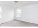 Sunlit bedroom with carpet and bright white walls at 7404 Prato Ct, Wendell, NC 27591