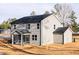 Beautiful home with a screened porch and grey siding at 7404 Prato Ct, Wendell, NC 27591