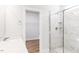 Bathroom featuring a walk-in tiled shower and a walk-in closet at 472 Barbour Farm Ln, Four Oaks, NC 27524