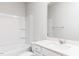 Bathroom featuring a tub, toilet, vanity with countertop, sink, and mirror at 472 Barbour Farm Ln, Four Oaks, NC 27524