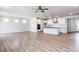 Open concept floor plan seamlessly connects the kitchen and living room areas at 472 Barbour Farm Ln, Four Oaks, NC 27524