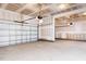 Spacious two-car garage with concrete flooring and drywall ready for finishing at 576 Barbour Farm Ln, Four Oaks, NC 27524
