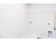 Utility room featuring modern hook-ups and wire shelving at 674 Barbour Farm Ln, Four Oaks, NC 27524
