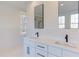 Modern bathroom with double vanity, white subway tile and black fixtures at 8780 Old Nc 86, Chapel Hill, NC 27516