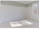 Spacious bedroom with large window and neutral color palette at 8780 Old Nc 86, Chapel Hill, NC 27516