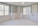 Spacious bedroom with light walls and carpeting at 8780 Old Nc 86, Chapel Hill, NC 27516