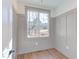 Bright home office features gray board and batten walls and hardwood floors at 8780 Old Nc 86, Chapel Hill, NC 27516