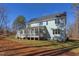 Two story house with screened porch at 8780 Old Nc 86, Chapel Hill, NC 27516