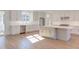 Open kitchen with large island and stainless steel appliances at 8780 Old Nc 86, Chapel Hill, NC 27516