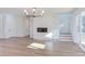 Bright living room with hardwood floors, fireplace and access to porch at 8780 Old Nc 86, Chapel Hill, NC 27516