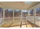 Spacious screened porch with wood decking and wooded views at 8780 Old Nc 86, Chapel Hill, NC 27516