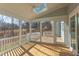 Bright screened porch with skylight and ceiling fan at 8780 Old Nc 86, Chapel Hill, NC 27516