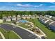A new community featuring modern designed homes, a pool, and playground area at 1573 Ivy Meadow Ln, Zebulon, NC 27597