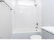 Bright bathroom features a shower and tub combination with white subway tile at 81 Autumn Gate St, Pittsboro, NC 27312