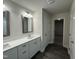 Modern bathroom with double vanity and grey flooring at 99 Mapledale Ct, Benson, NC 27504