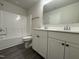 Bathroom boasts double vanity, shower/tub combo, and modern fixtures at 99 Mapledale Ct, Benson, NC 27504