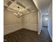 Elegant dining room with chandelier and wood flooring at 99 Mapledale Ct, Benson, NC 27504
