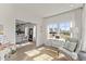 Bright, open-concept living room with desk, chair, and natural light at 516 Marthas View Way, Rolesville, NC 27587