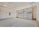 Large garage with open door and concrete floor at 7211 Pilatus Ave, Spring Hope, NC 27882