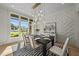 Bright dining room with natural light, designer lighting, and stylish decor at 7417 Dover Hills Dr, Wake Forest, NC 27587