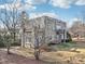 Stone house exterior, multiple stories, and large yard at 728 W Davis St, Burlington, NC 27215